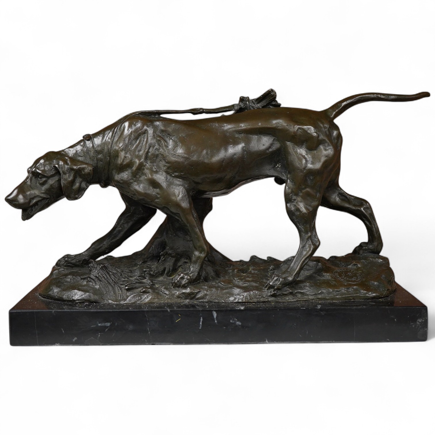 A patinated bronze of a hunting dog, signed Coreira, on black marble base, 36cm wide